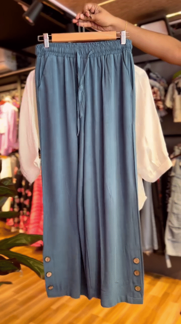 Two-Piece Set Featuring a Relaxed-Fit Blue Button-Detail Palazzo Pant and Embroidered White Half-Sleeve Top with Mandarin Collar Perfect for Casual Chic and Comfortable Style - Image 2