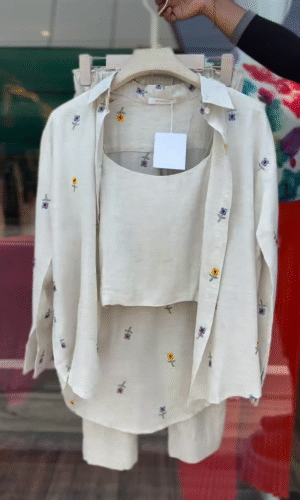 Three-Piece Beige Co-Ord Set Featuring a Sleeveless Crop Top, Button-Down Shirt with Multicolor Floral Embroidery, and Matching Elastic Waist Trousers – Lightweight, Breathable, and Perfect for Effortless Everyday Elegance