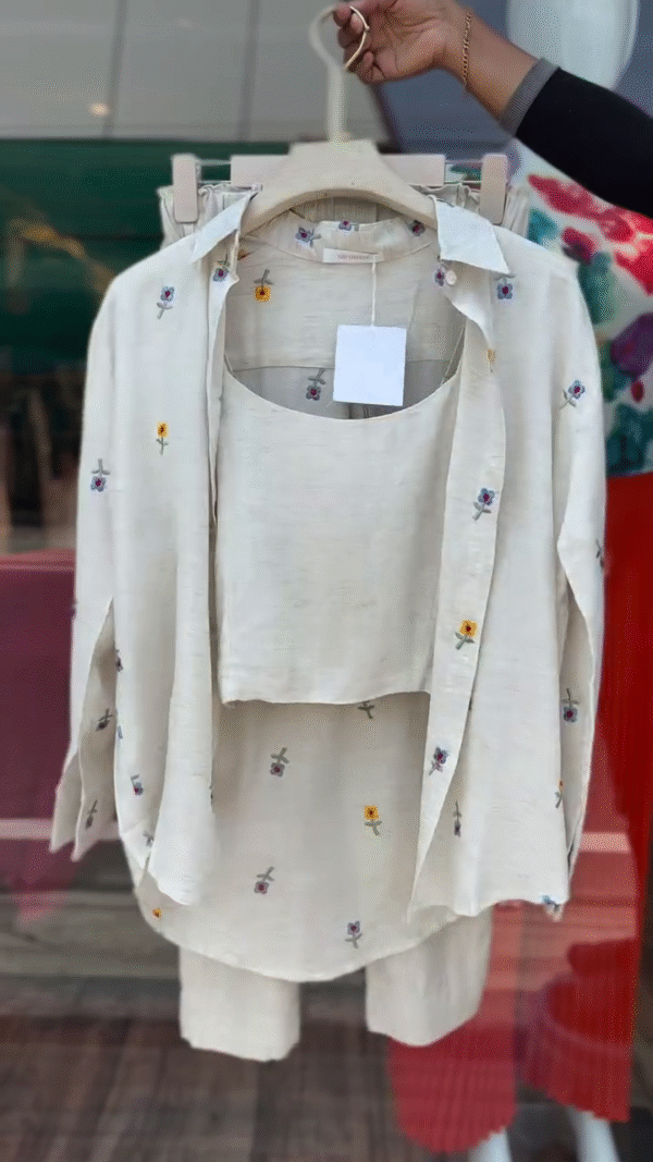 Three-Piece Beige Co-Ord Set Featuring a Sleeveless Crop Top, Button-Down Shirt with Multicolor Floral Embroidery, and Matching Elastic Waist Trousers – Lightweight, Breathable, and Perfect for Effortless Everyday Elegance