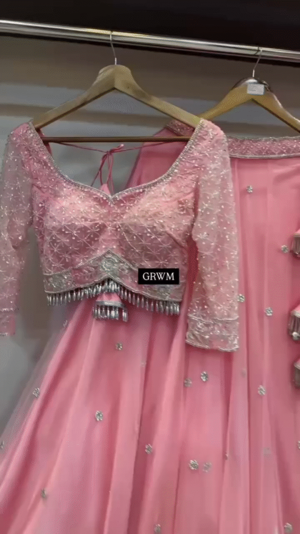 Baby Pink Designer Lehenga Choli Set with Sequined Net Blouse, Delicate Mirror and Thread Embellishments, Tassel Accents, and Matching Sheer Dupatta Featuring Intricate Floral Border Work – Perfect for Weddings, Receptions, and Festive Occasions - Image 3