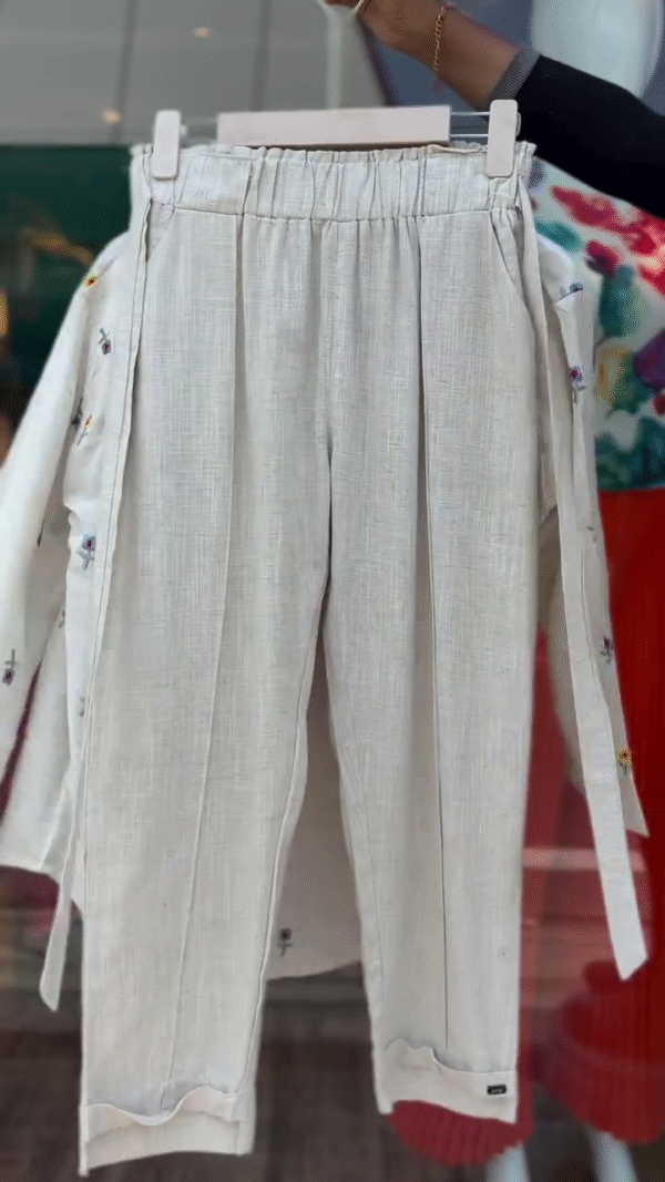 Three-Piece Beige Co-Ord Set Featuring a Sleeveless Crop Top, Button-Down Shirt with Multicolor Floral Embroidery, and Matching Elastic Waist Trousers – Lightweight, Breathable, and Perfect for Effortless Everyday Elegance - Image 2